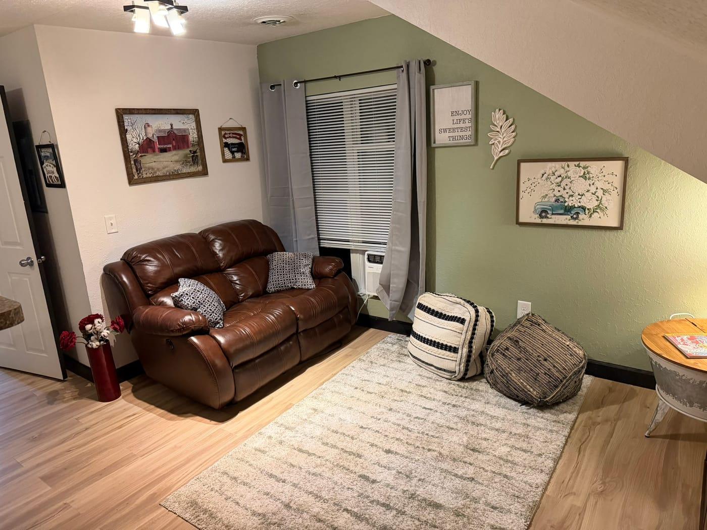The living room of a Rose’s Village stay on Center Street