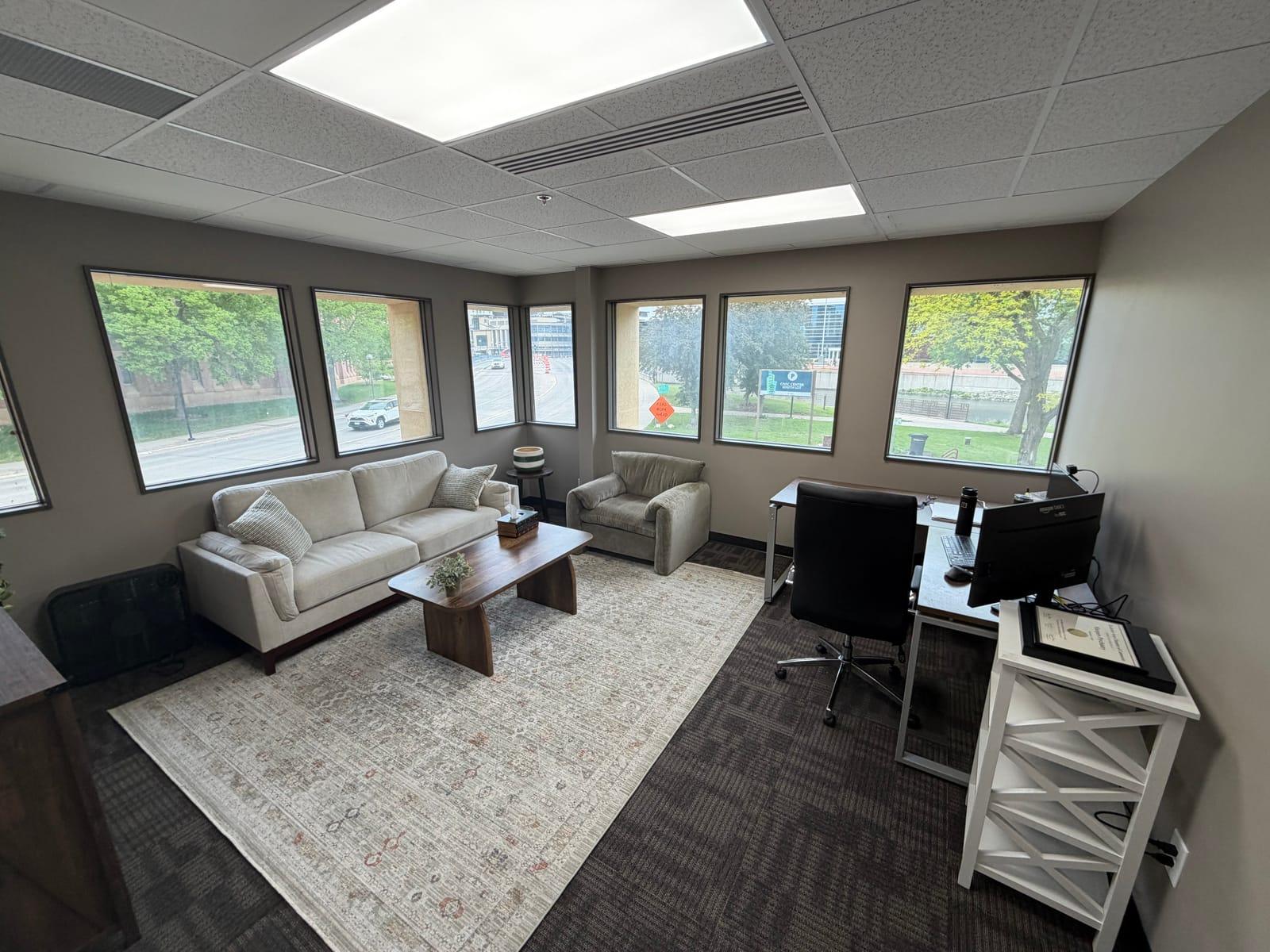 A private office at The Hub on 3rd with downtown Rochester views